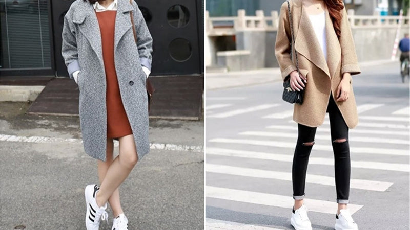 Cô gái ấm áp trong áo khoác dạ màu kem, chân váy đen và giày thể thao độn đế trắng, phù hợp cho ngày đông