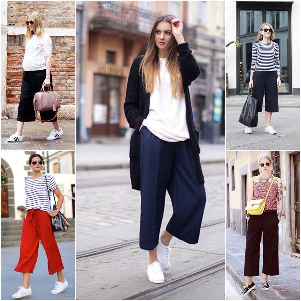 Cô gái diện áo phông trắng, quần culottes màu cam đất và giày sneaker trắng