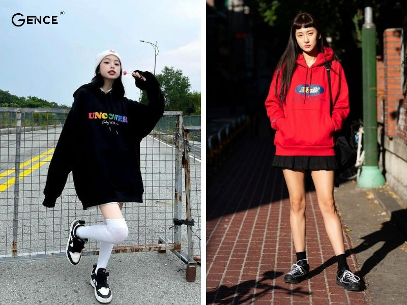 Cô gái mặc áo hoodie rộng và giày sneaker đen