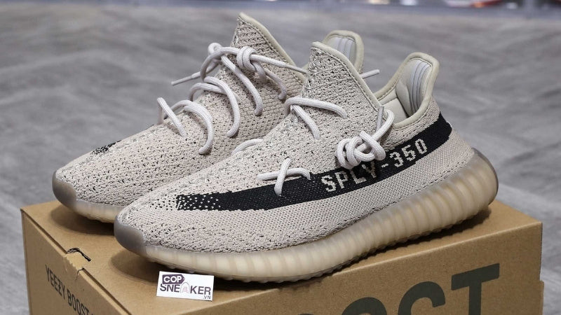 Giày Adidas Yeezy 350 màu kem và xám, thiết kế hiện đại cho nữ