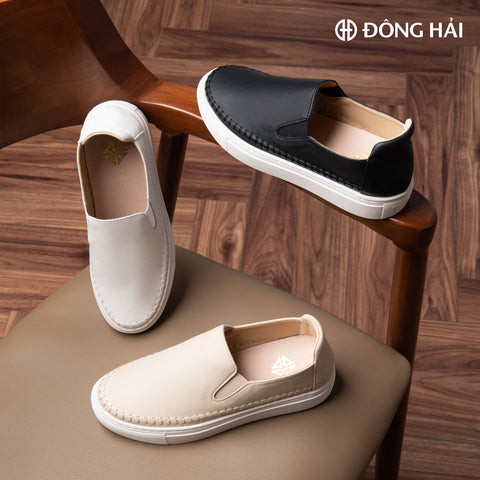 Giày sneaker nữ màu trắng với điểm nhấn họa tiết độc đáo, thích hợp cho phong cách năng động ở Biên Hòa