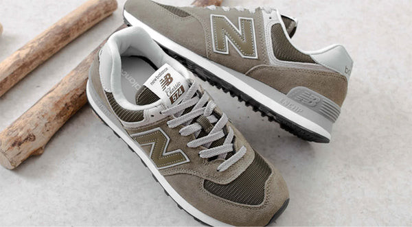 Logo và biểu tượng thương hiệu New Balance, minh họa tầm quan trọng của việc kiểm tra giày chính hãng