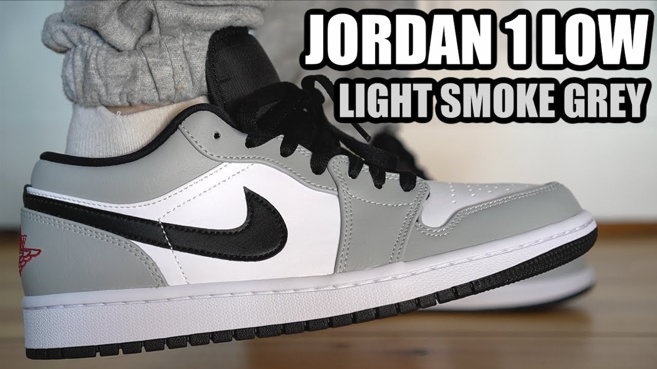 Mẫu giày Nike Jordan 1 Low Grey trên chân, vẻ đẹp đơn giản mà tinh tế.