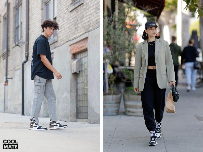 Một cô gái mặc áo hoodie trắng, quần jean và giày Jordan đen trắng