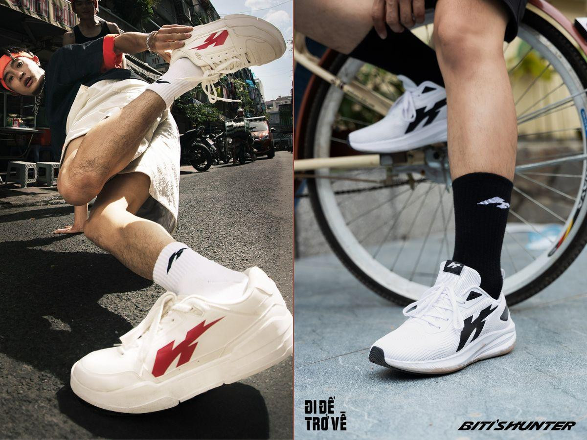 Một người đang buộc dây giày sneaker local brand, thể hiện sự thoải mái và sẵn sàng cho các hoạt động hàng ngày