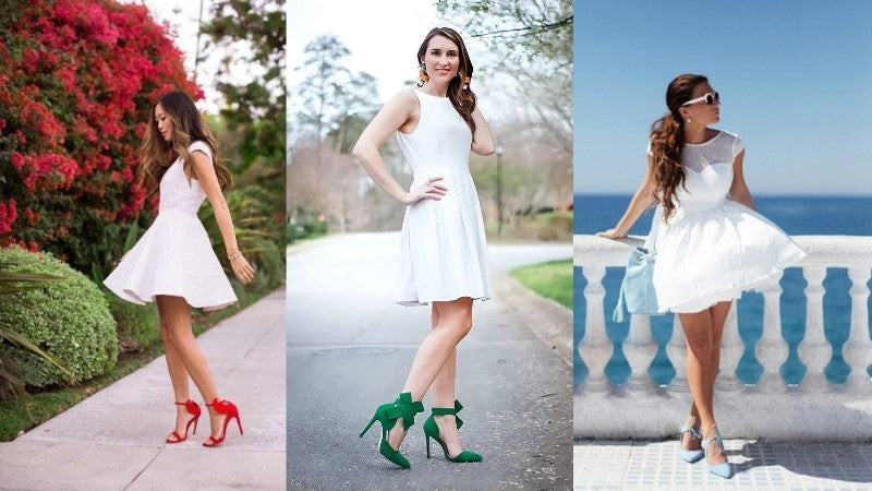 Người mẫu mặc váy trắng midi và giày thể thao màu sắc nổi bật cá tính