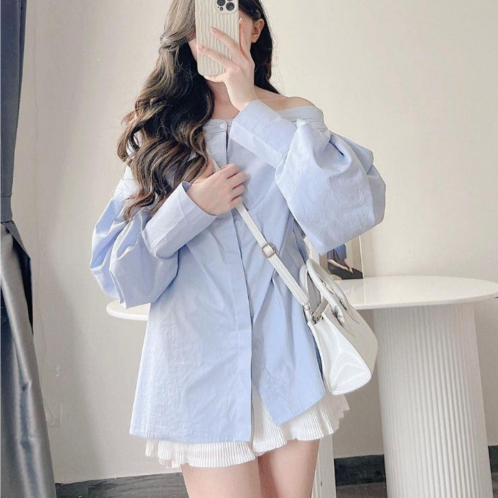 Phong cách nhẹ nhàng với áo sơ mi dáng dài giấu quần phối cùng quần giả váy