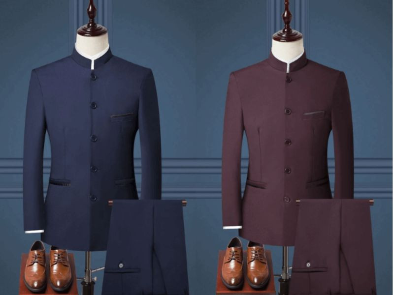 Người mẫu mặc áo vest nam cổ tàu màu xanh navy tại sự kiện trang trọng