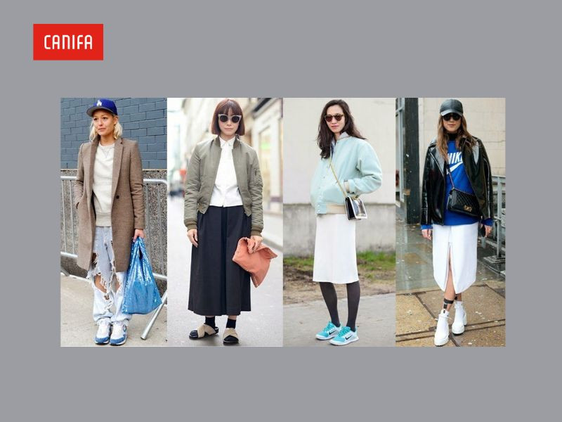 Một cô gái mặc trang phục Normcore đơn giản: áo phông trắng, quần jeans, giày sneaker, thể hiện sự thoải mái