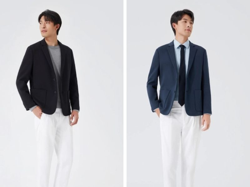 Người đàn ông mặc áo khoác giả vest nam màu xanh navy phối cùng áo thun trắng
